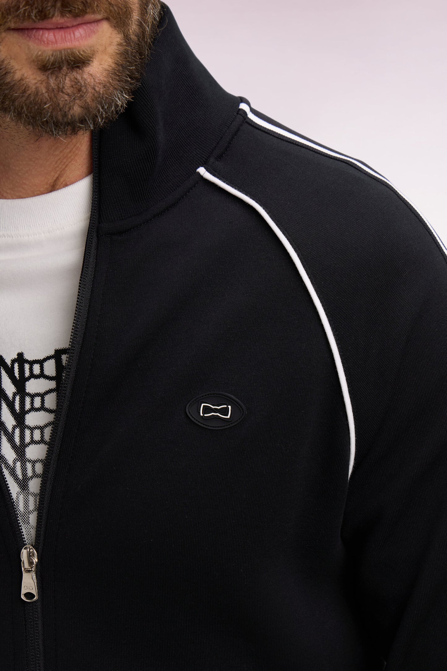 Sweatshirt zippé en interlock noir découpes ruban coupe regular