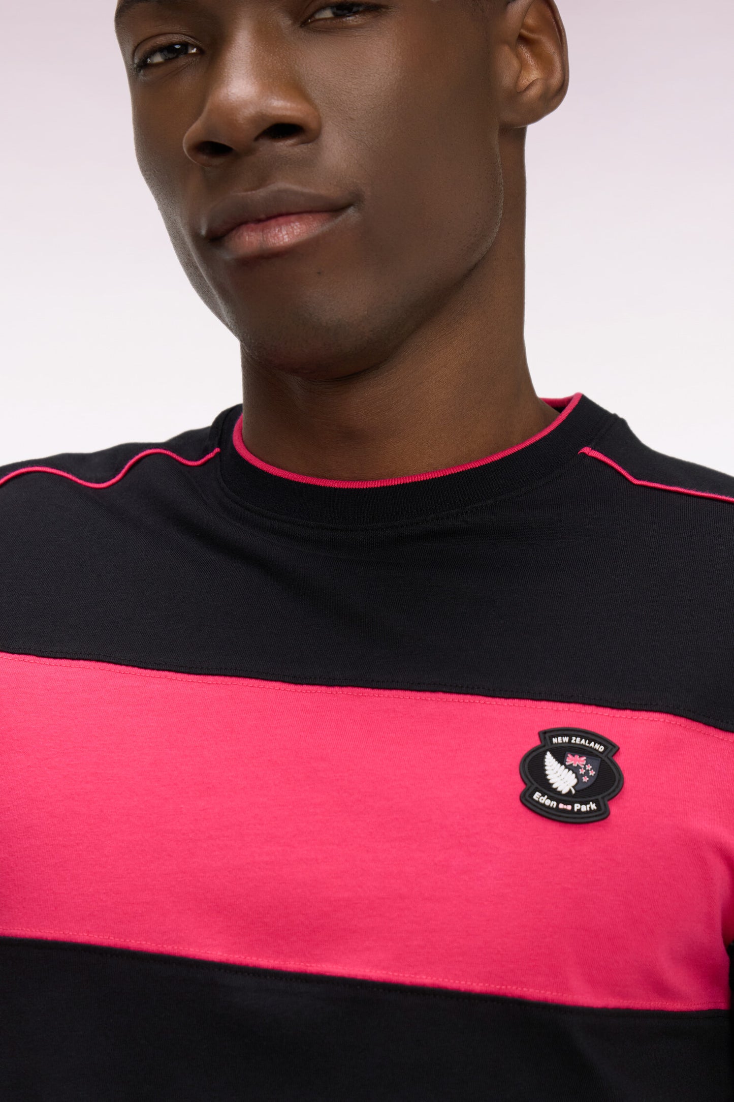 New Zealand short-sleeved T-shirt in black cotton with cutouts, regular fit