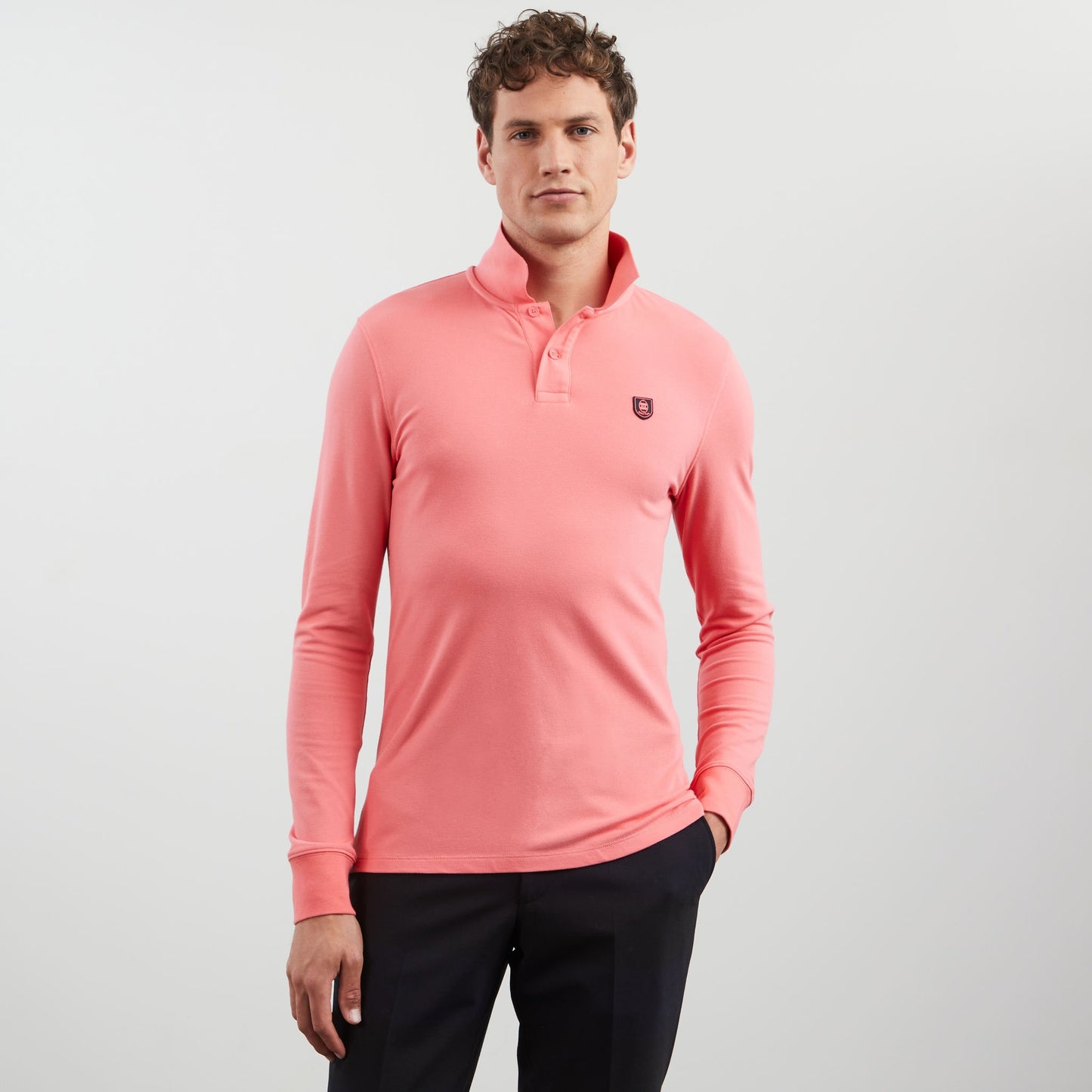 Pink long-sleeved polo shirt