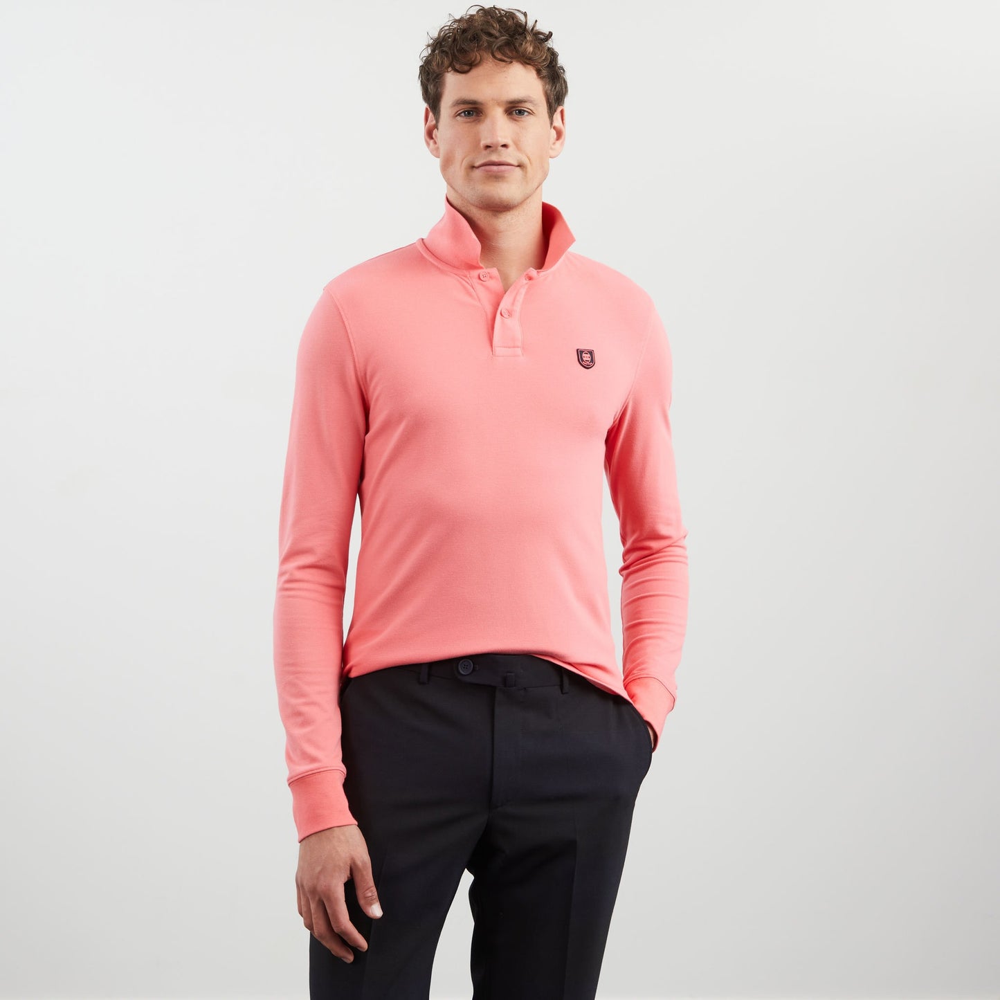 Pink long-sleeved polo shirt