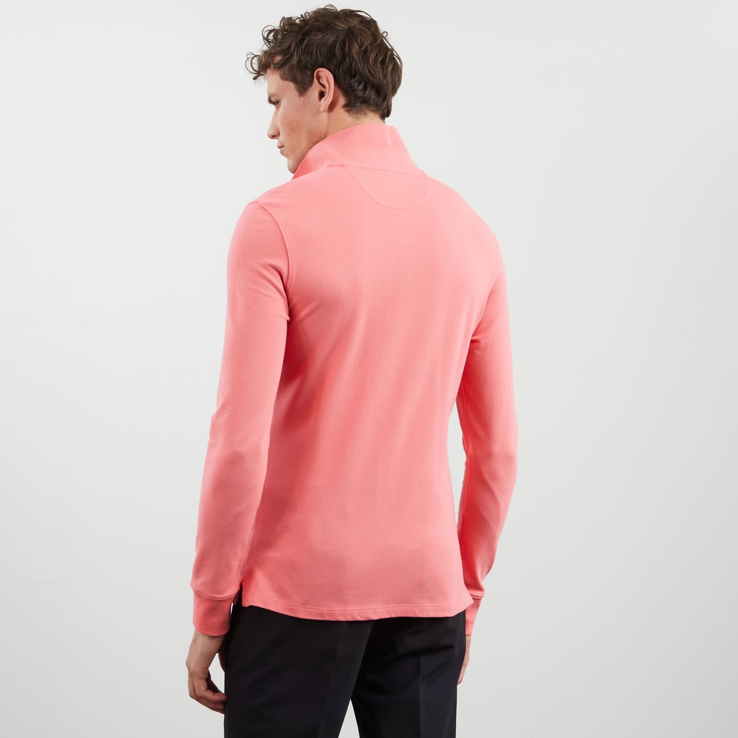 Pink long-sleeved polo shirt
