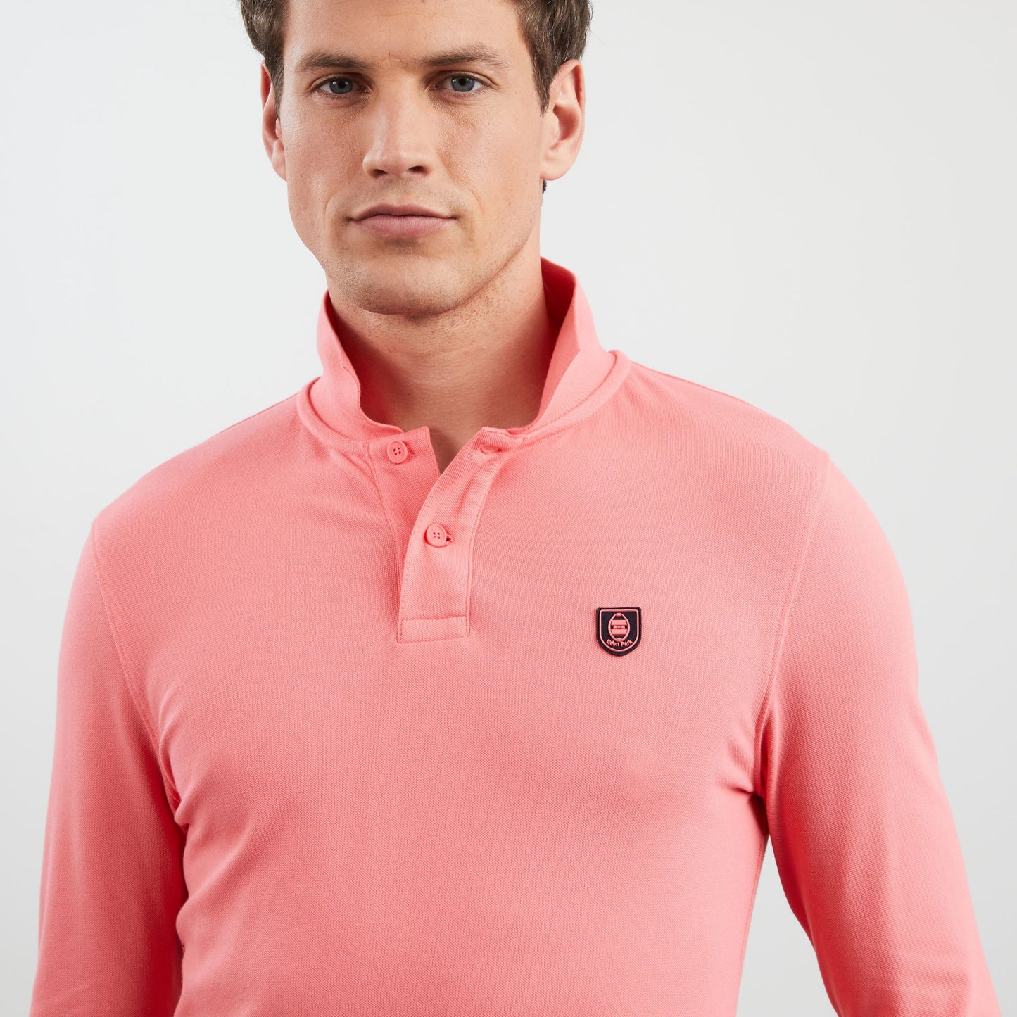 Pink long-sleeved polo shirt