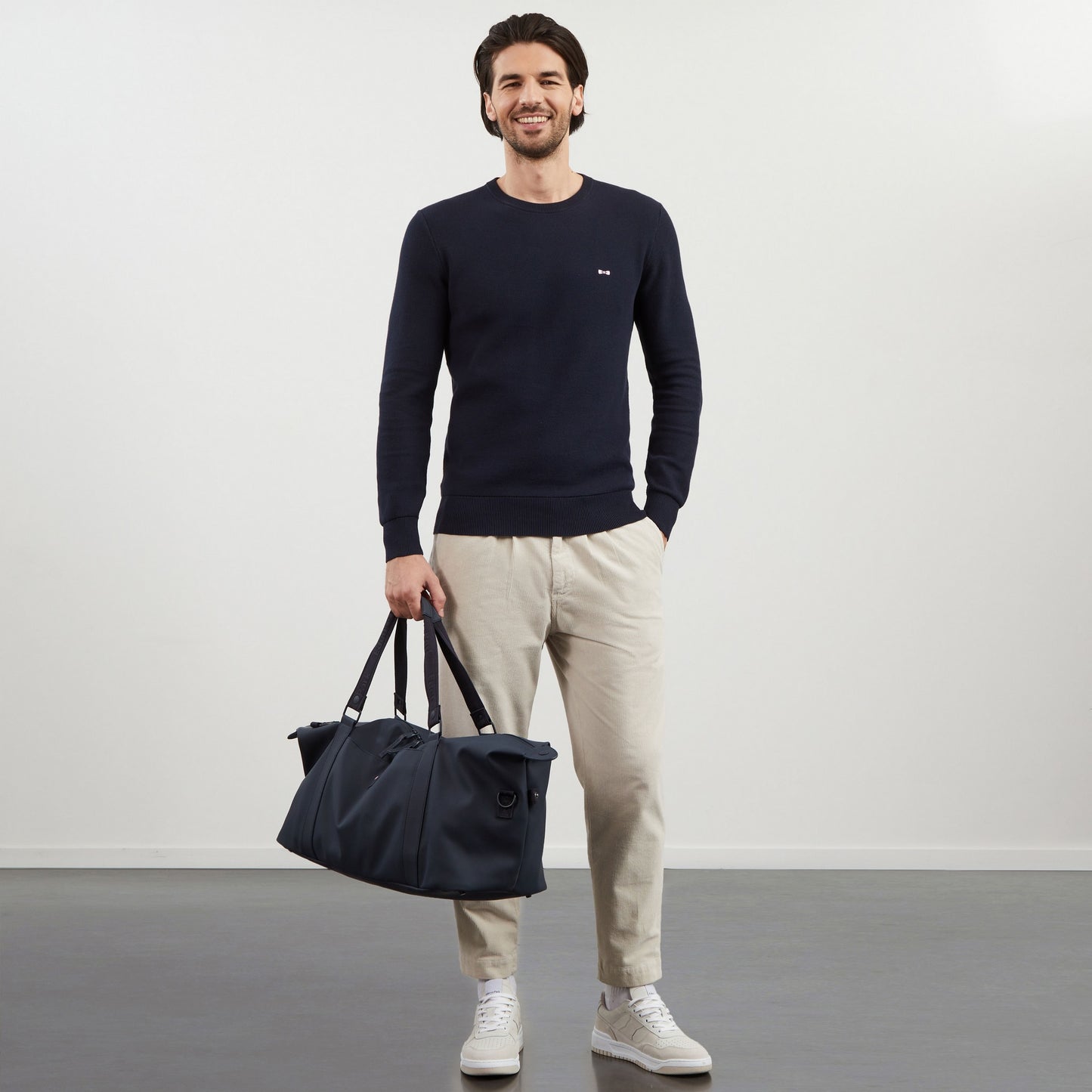 Dark blue jumper in decorative cable knit