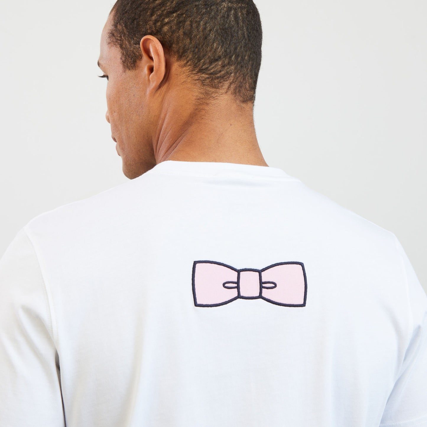 T-shirt blanc à broderie nœud dos