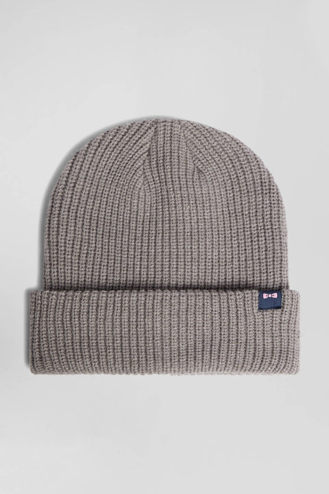 Mottled grey knitted beanie with bow tie embroidery - Image 1