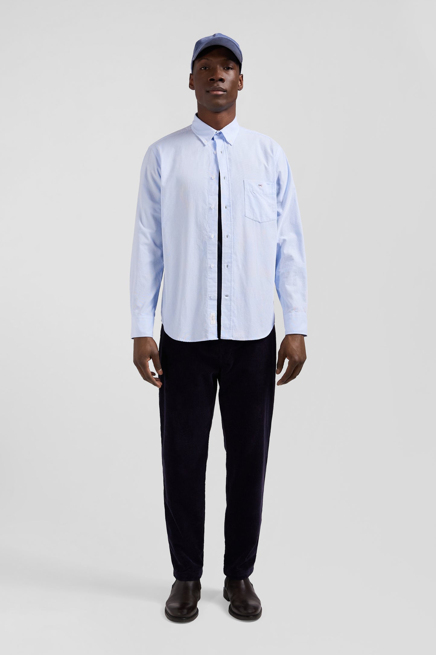 Regular plain sky blue cotton shirt with button-down collar and chest pocket