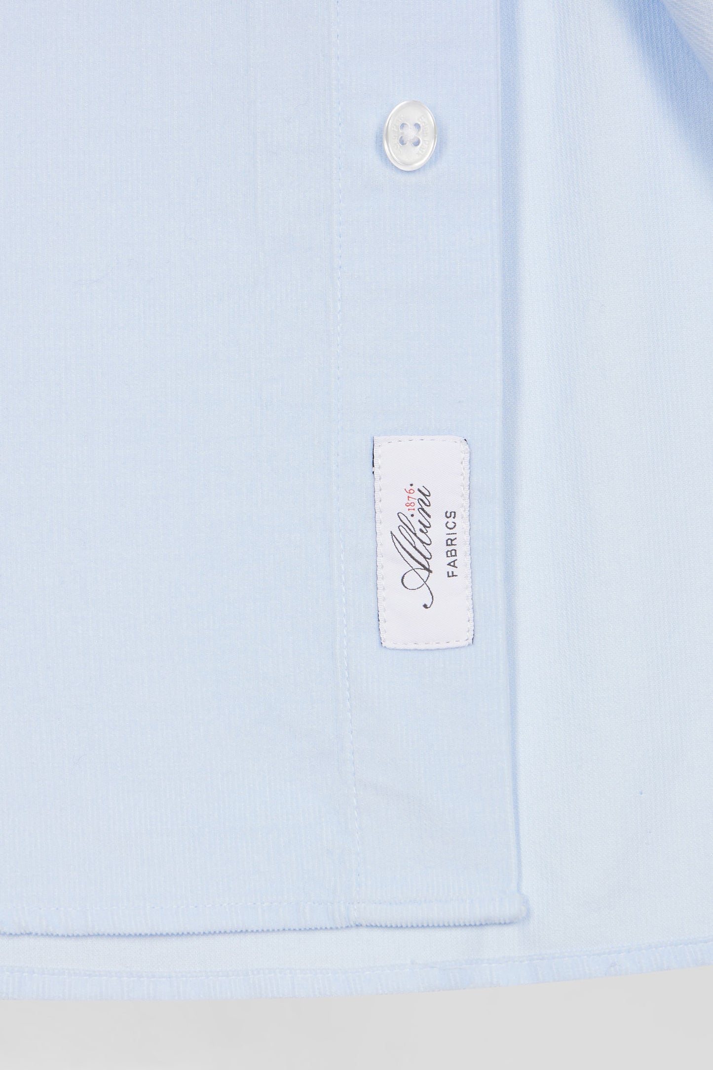 Regular plain sky blue cotton shirt with button-down collar and chest pocket