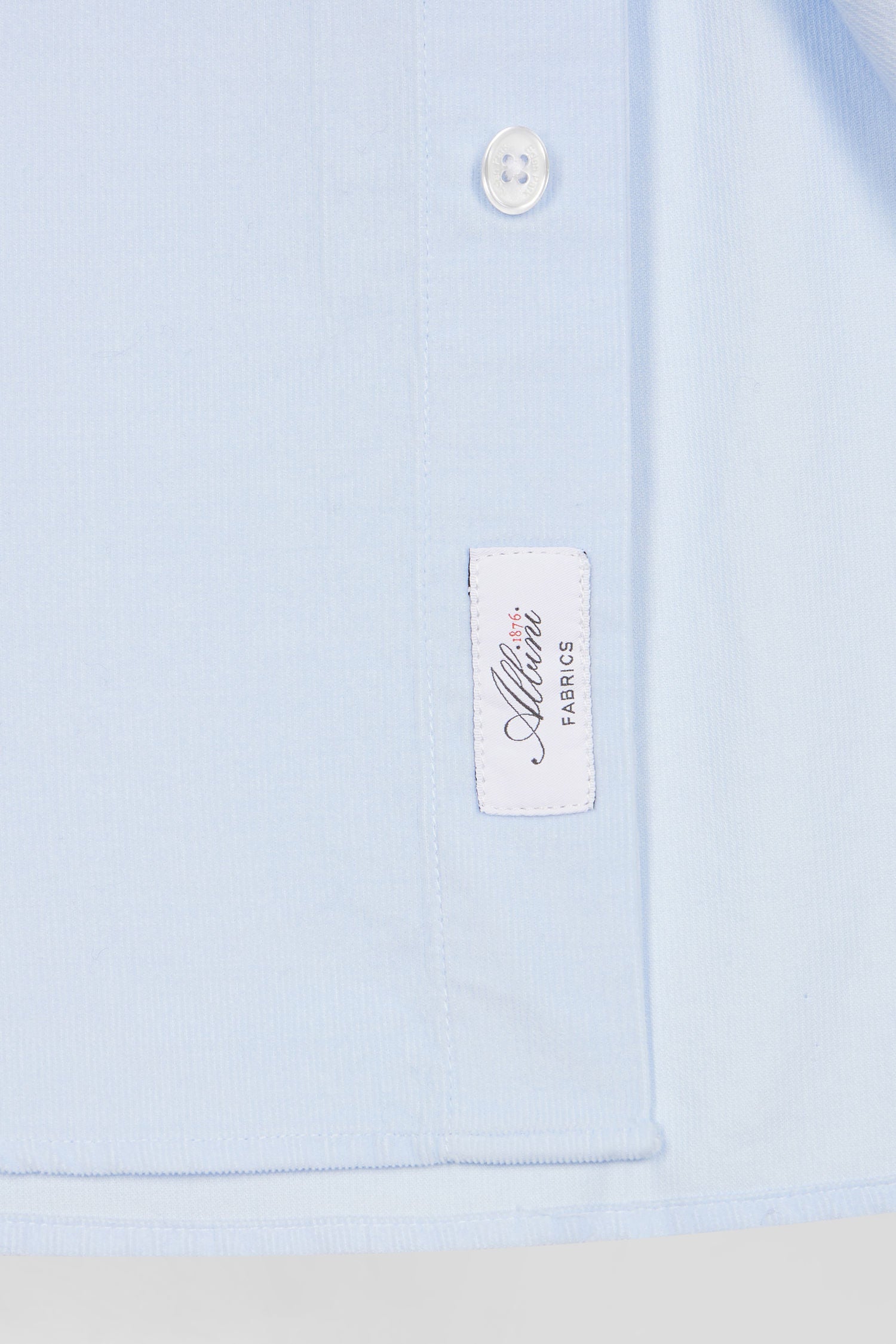 Regular plain sky blue cotton shirt with button-down collar and chest pocket