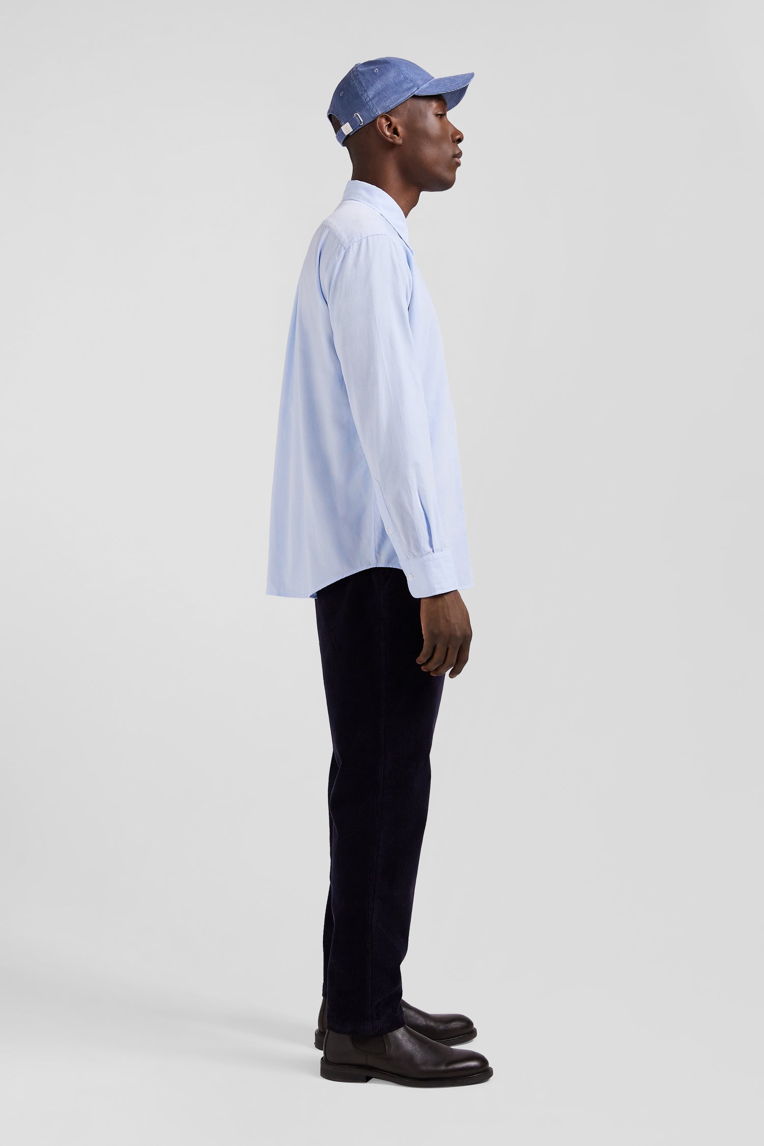 Regular plain sky blue cotton shirt with button-down collar and chest pocket