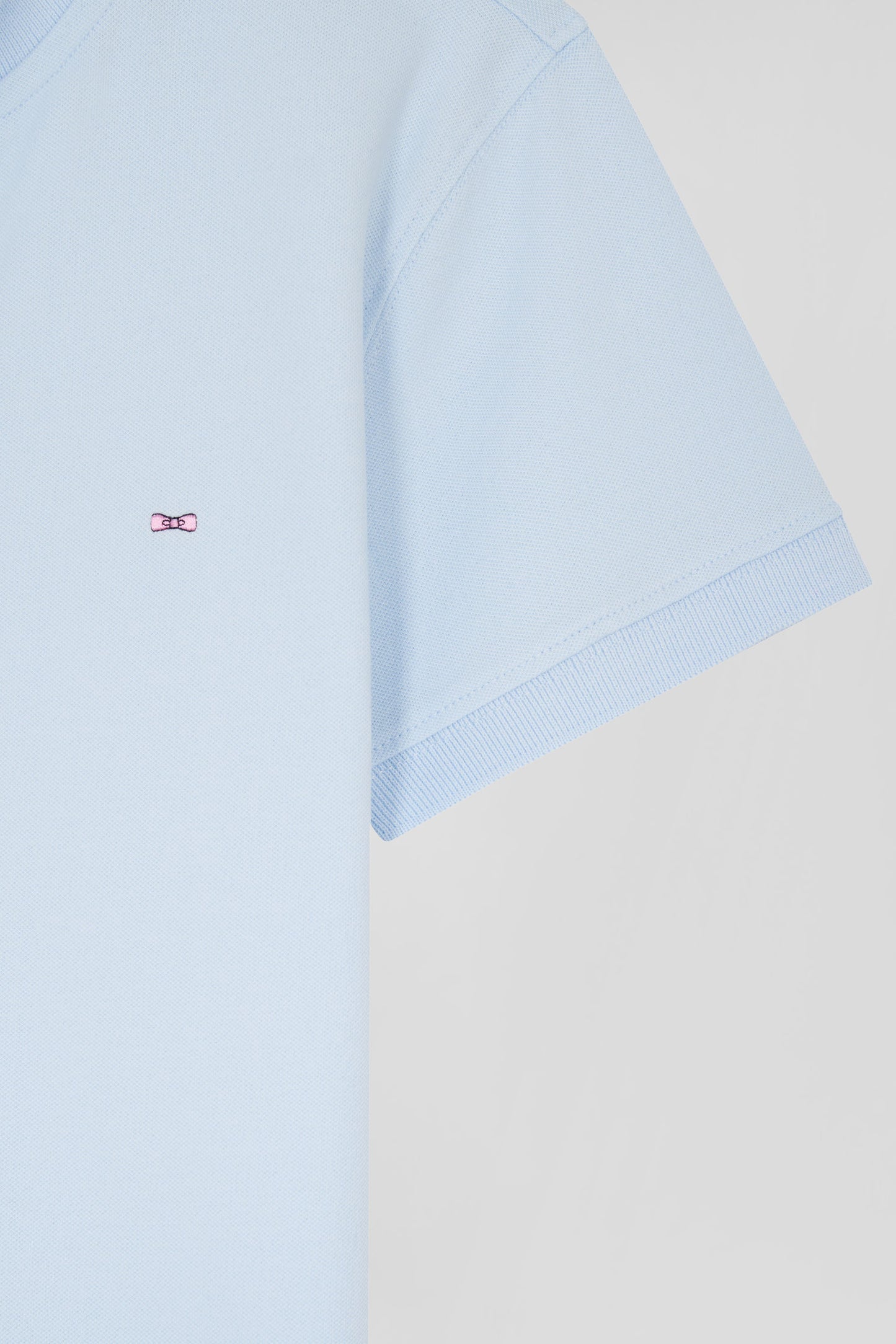 Polo manches courtes uni en coton stretch ciel coupe Slim