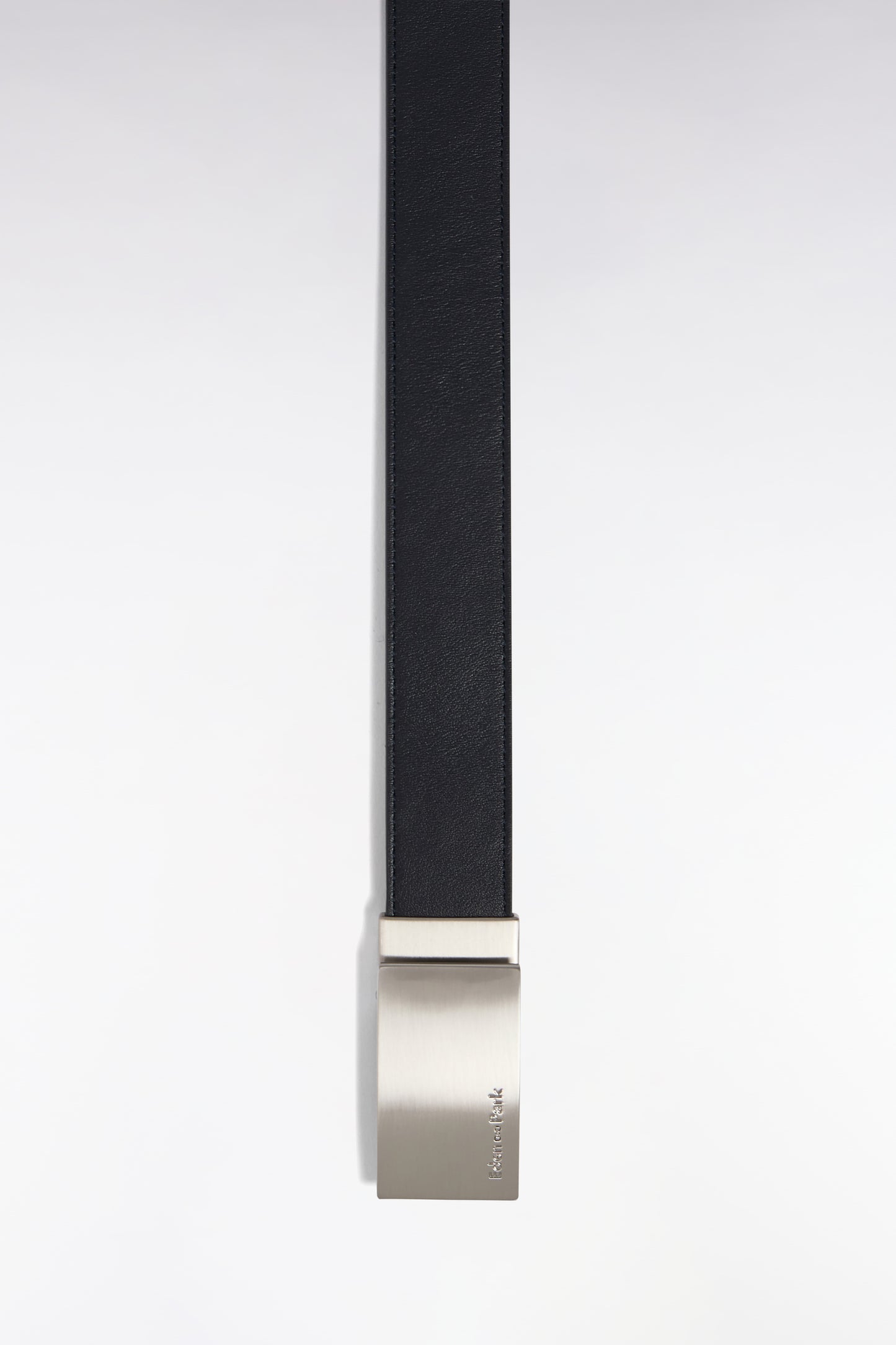 Reversible leather belt case with silver-plated buckles