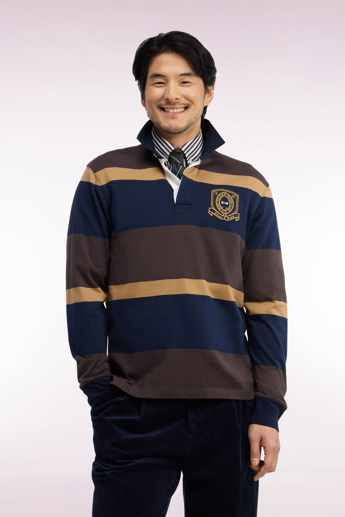 Maillot manches longues rayé marron avec broderie écusson