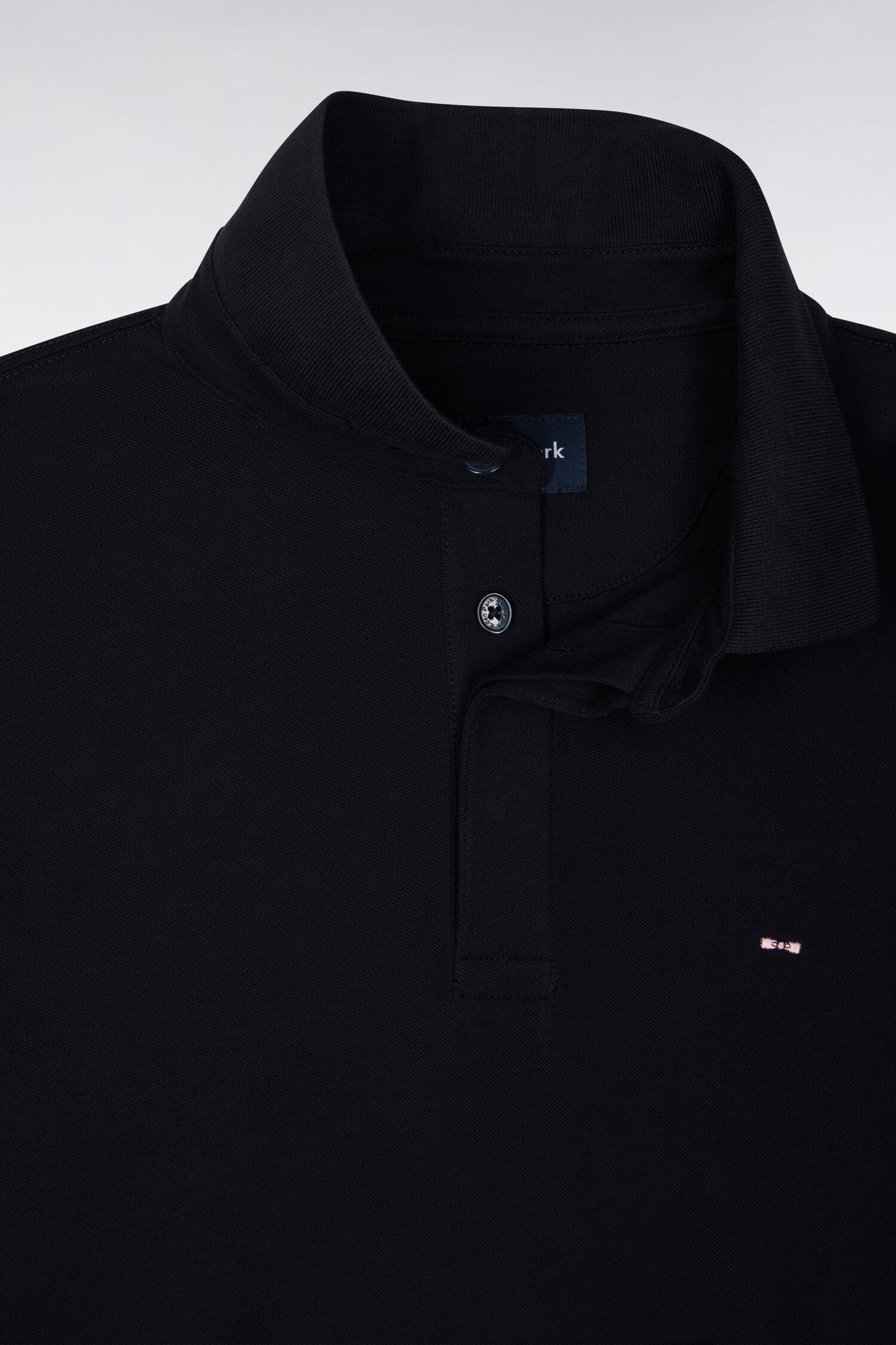 Polo manches courtes en coton stretch marine coupe ajustée