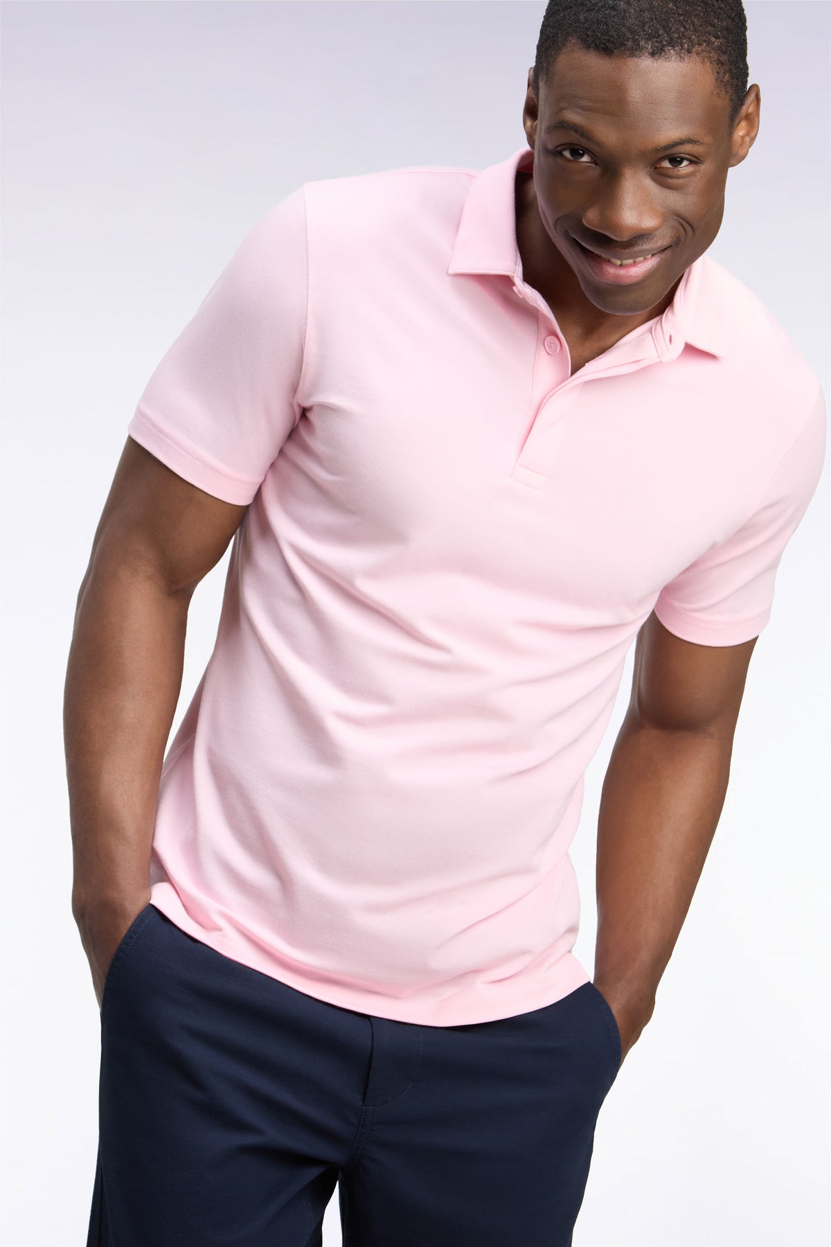 Polo golf manches courtes rose coupe droite