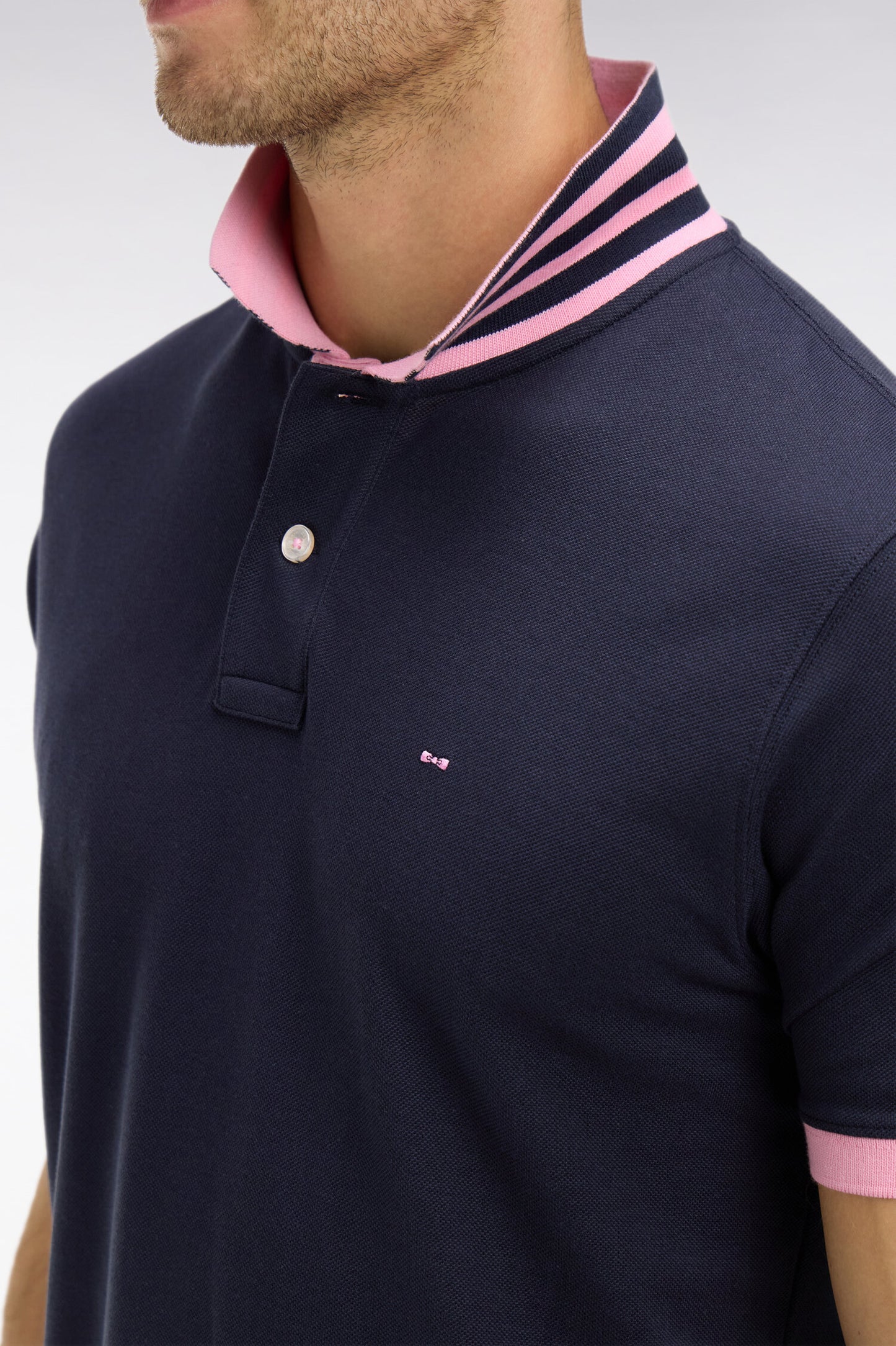 Navy blue pima cotton polo with contrasting accents