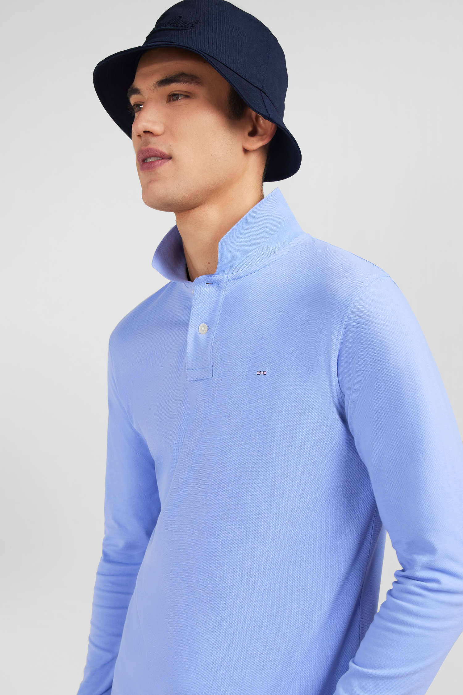 Polo manches longues bleu uni en piqué de coton stretch