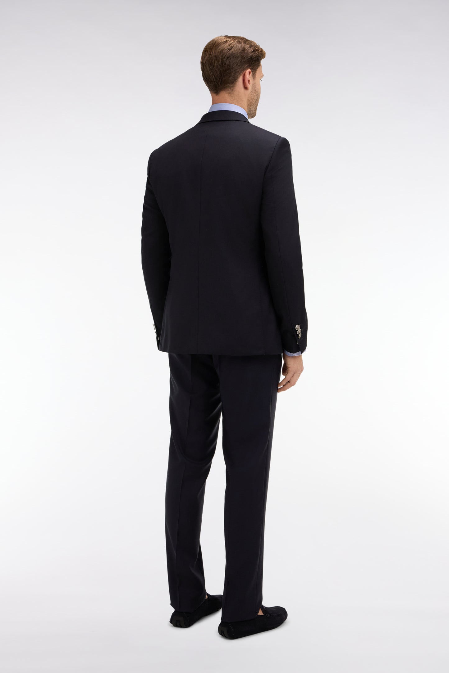 Regular dark blue wool trousers with broken fold