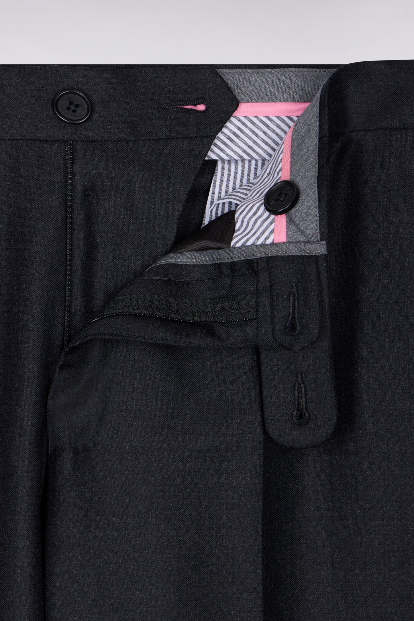 Regular dark grey wool trousers with broken fold