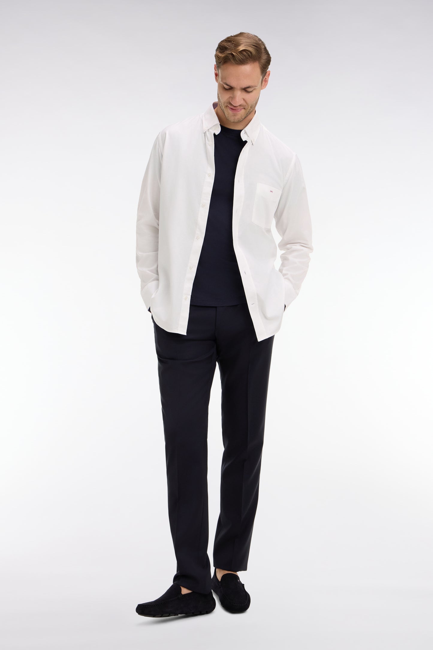 Slim dark blue wool trousers with broken fold
