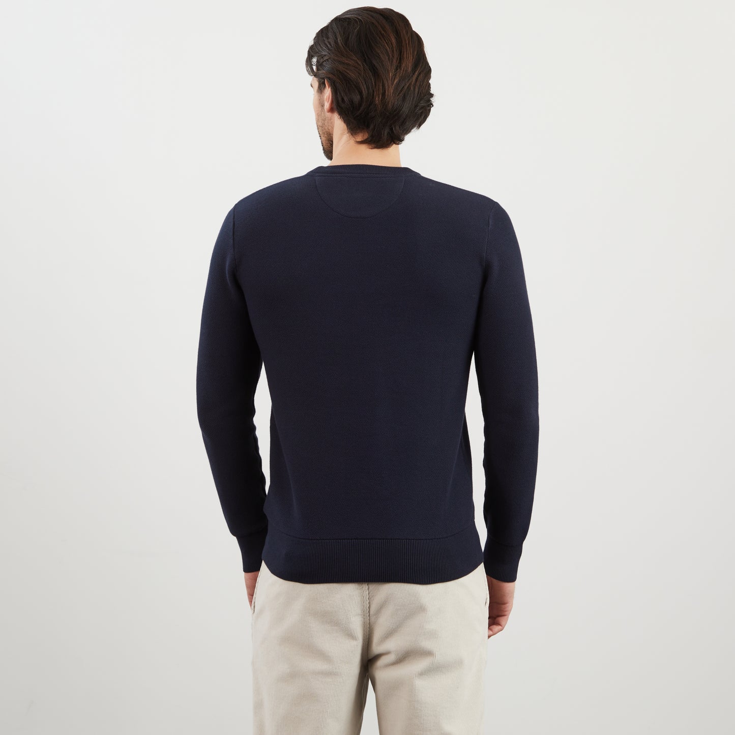Dark blue jumper in decorative cable knit