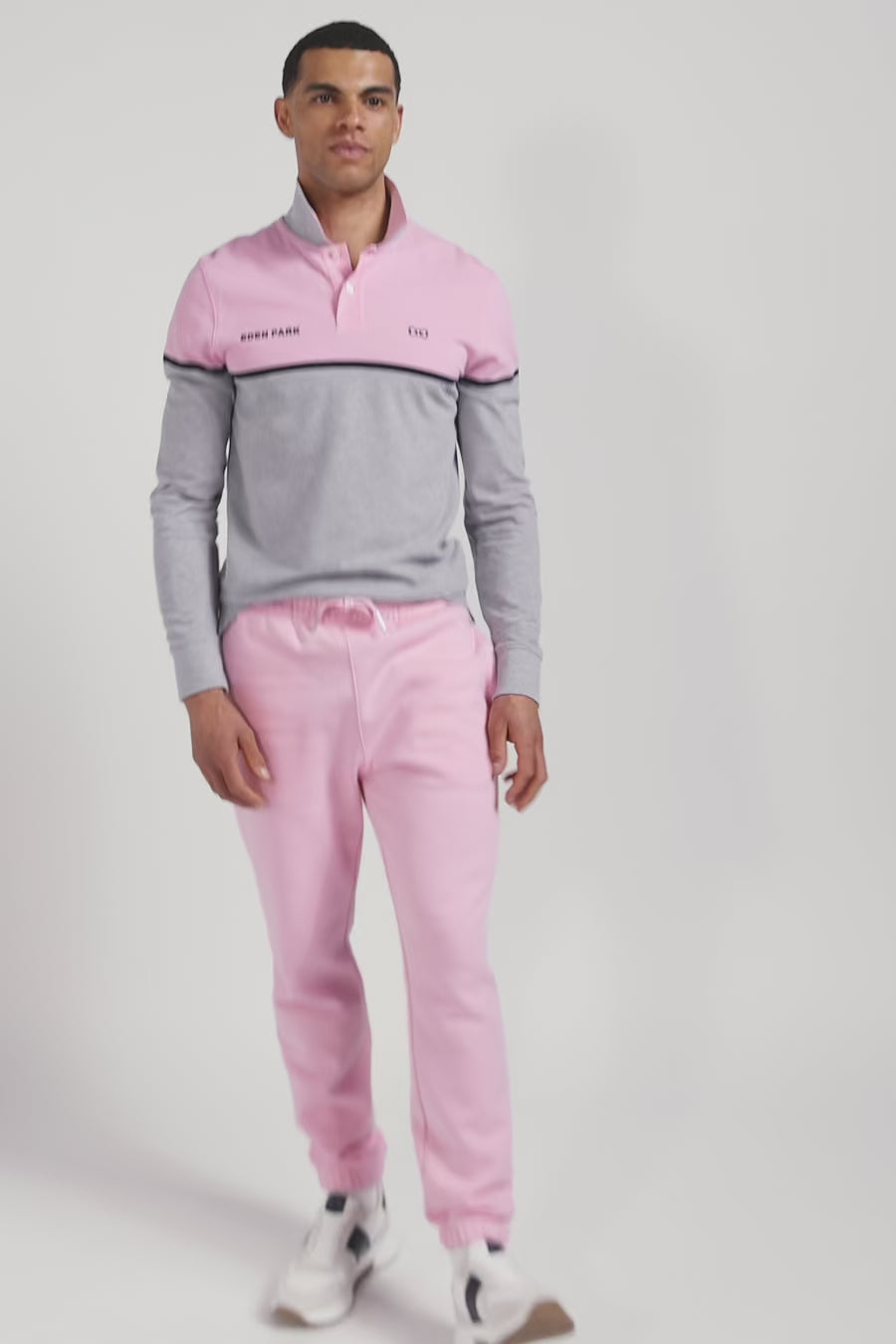 Polo manches longues bicolore en piqué coton rose coupe Regular