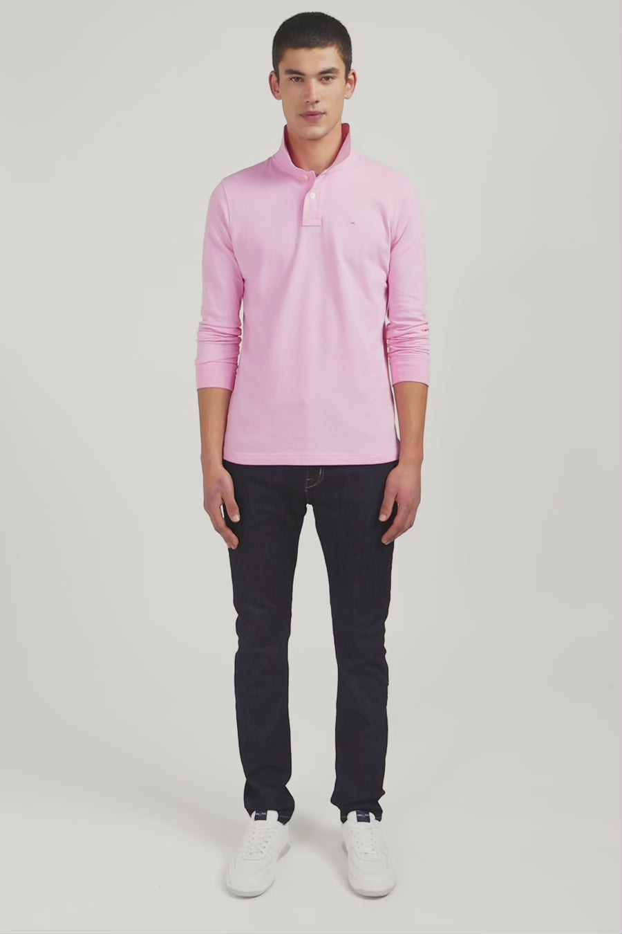 Polo manches longues rose uni en piqué de coton stretch