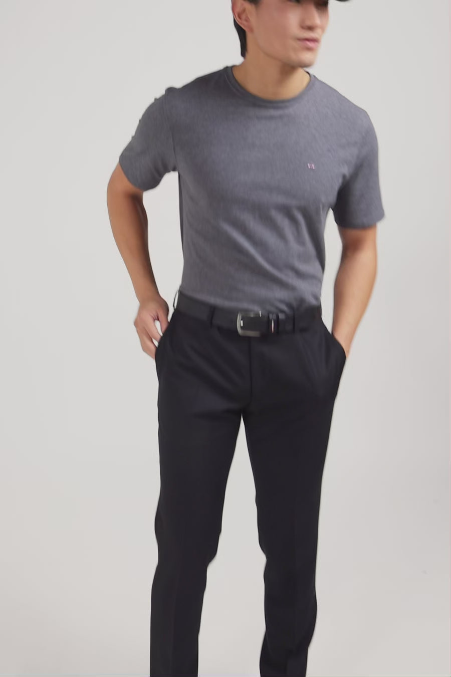 Pantalon slim noir en laine à plis cassés