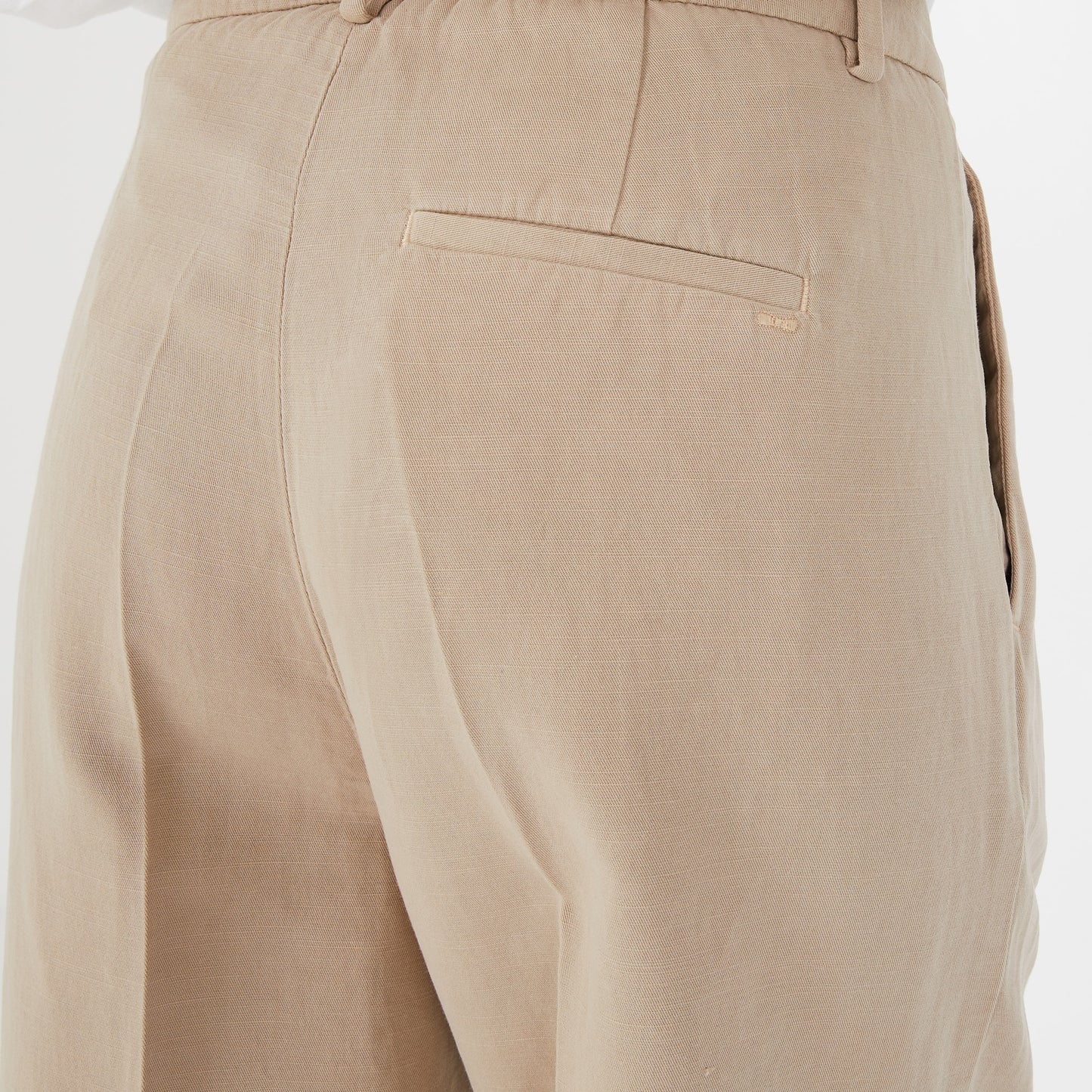 Beige carrot-fit trousers