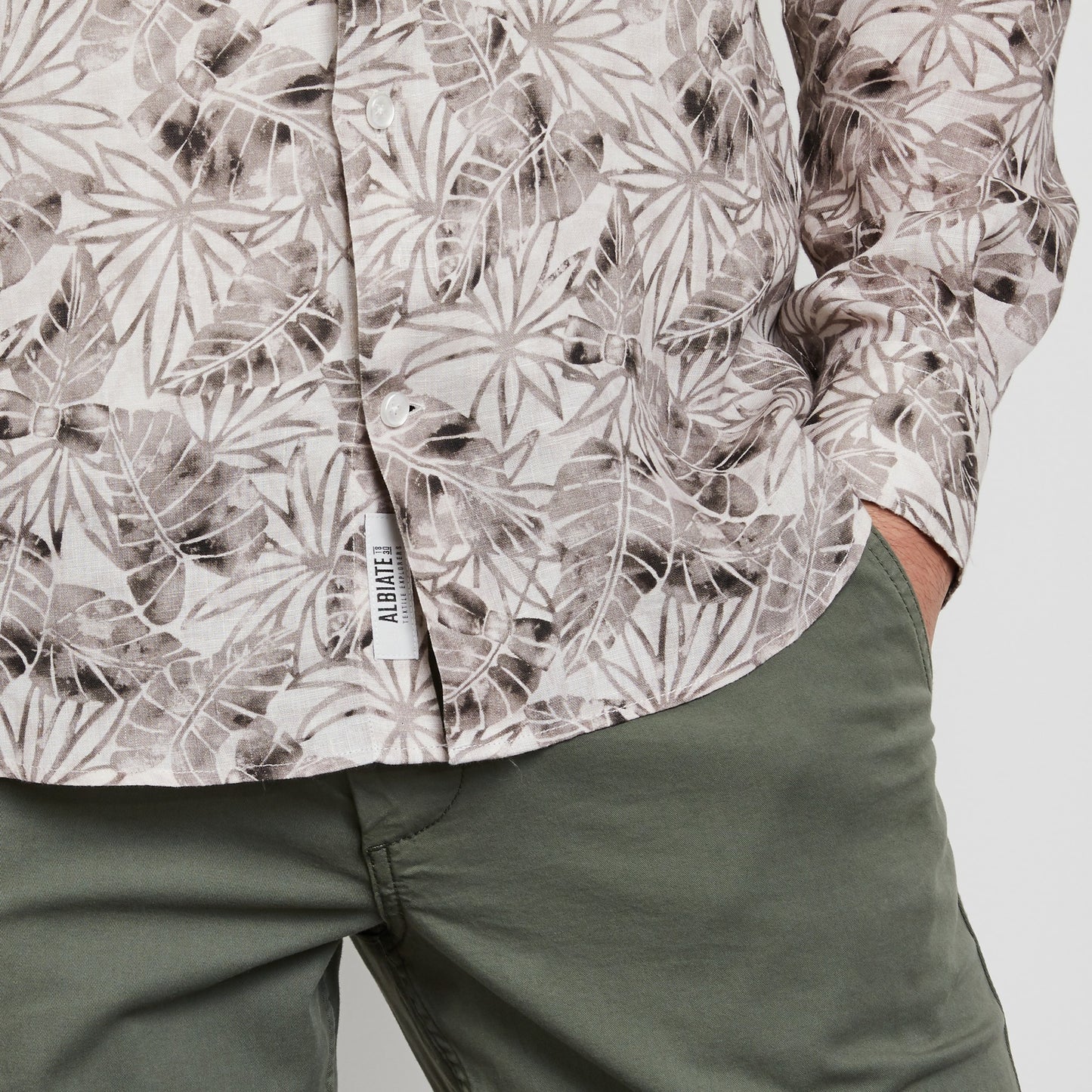 Beige linen shirt with a leaves print