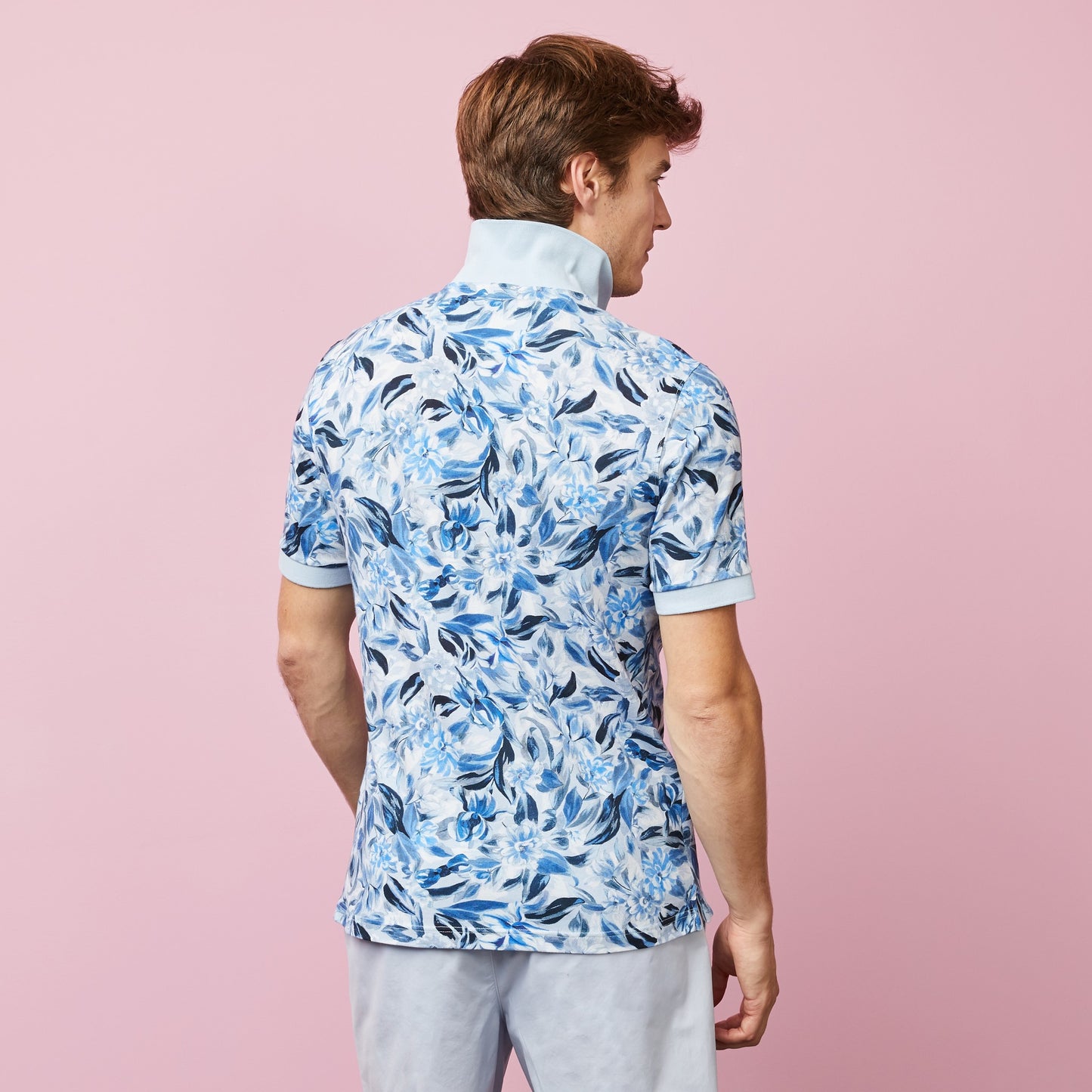 Light blue polo in cotton pique with floral print