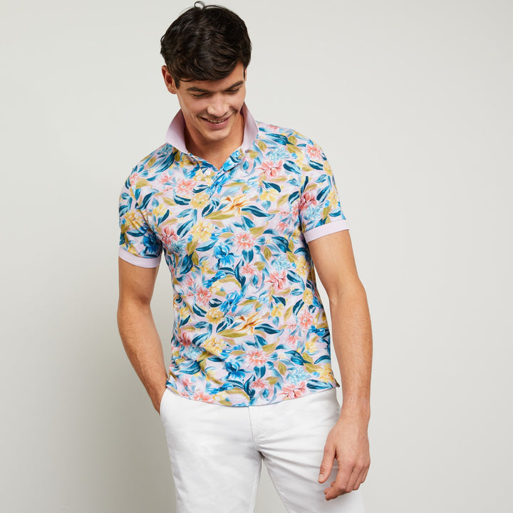 Pink polo in cotton pique with floral print